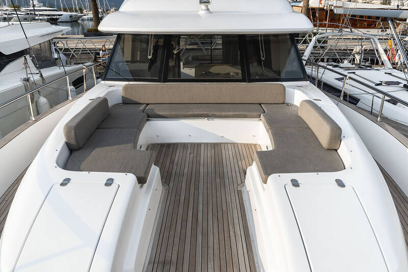 Sofa and sunbathing cushions on bow