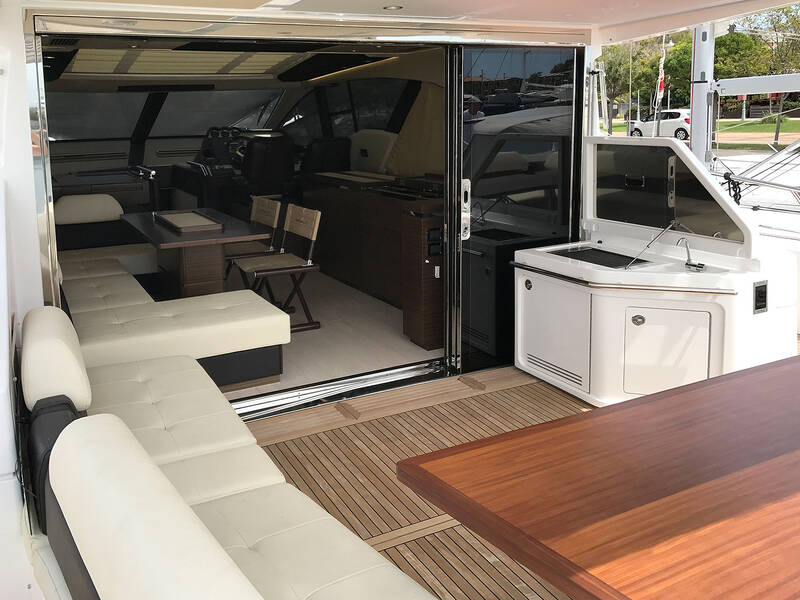 Cockpit cabinet with BBQ, refrigerator and trash compartment