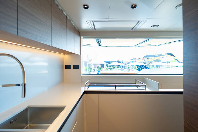 Galley with roll-down window